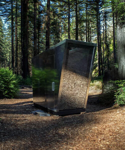 'the portal' toilet camouflages in the woods like a sci-fi doorway