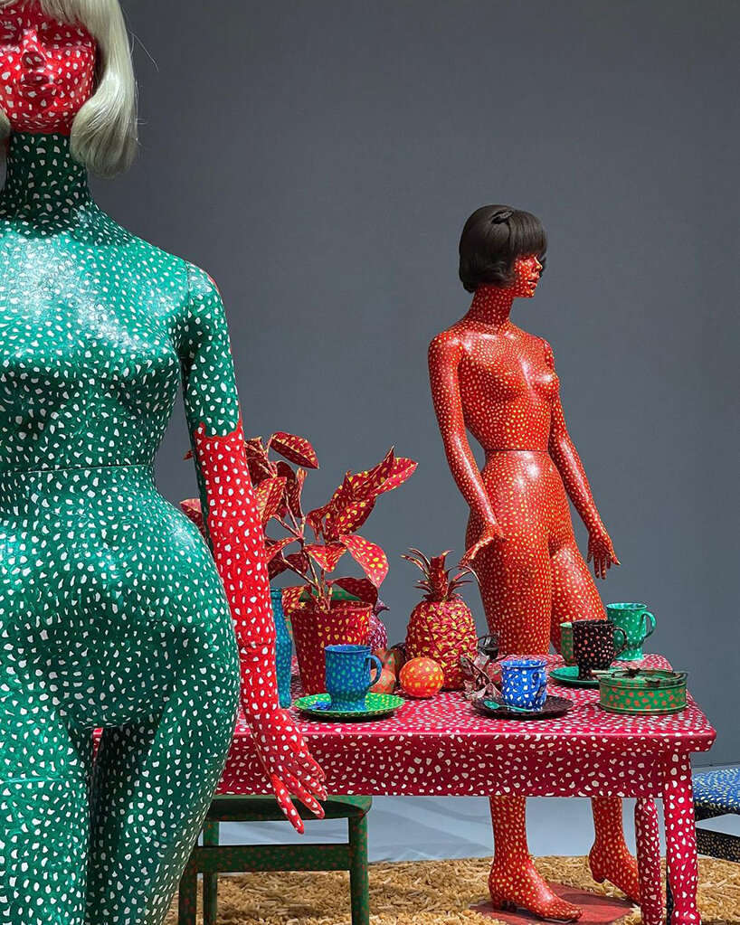 Installation of Yayoi Kusama's mannequin covers the exterior of
