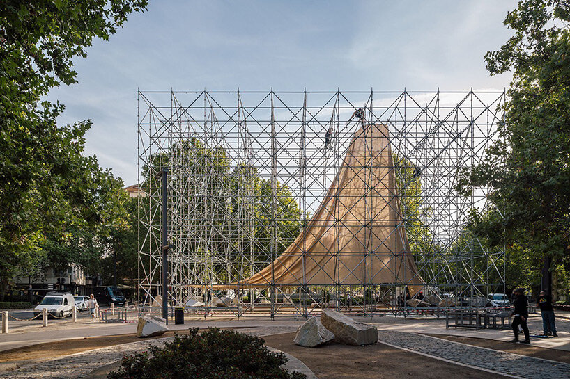 rising within a scaffold grid, P+S' AIRE pavilion creates a fragile atmosphere of air and light