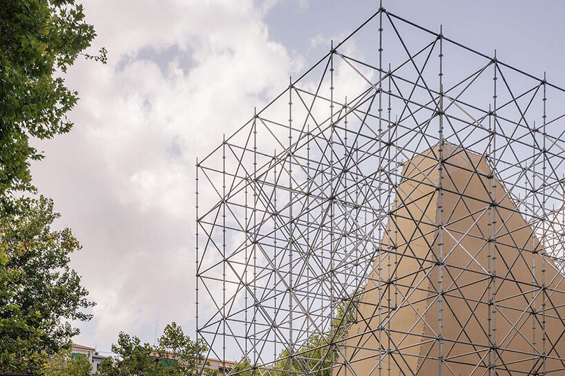 rising within a scaffold grid, P+S' AIRE pavilion creates a fragile atmosphere of air and light