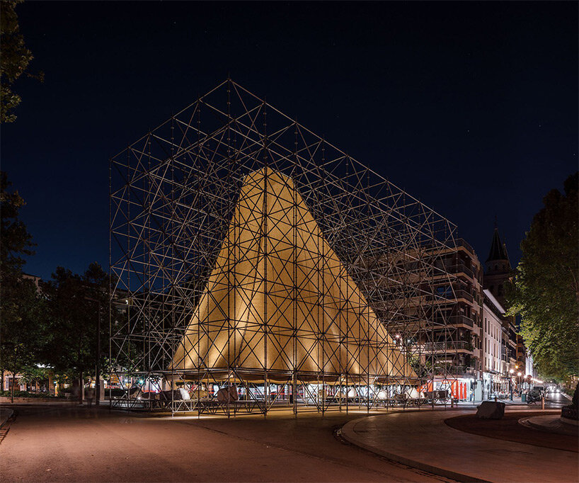 rising within a scaffold grid, P+S' AIRE pavilion creates a fragile atmosphere of air and light