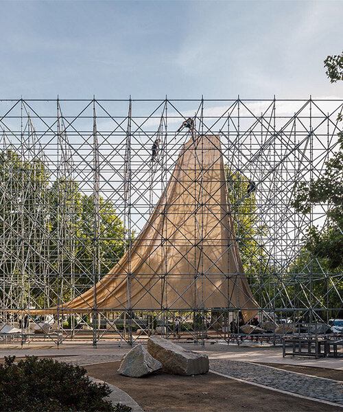 rising within a scaffold grid, P+S' AIRE pavilion creates a fragile atmosphere of air and light