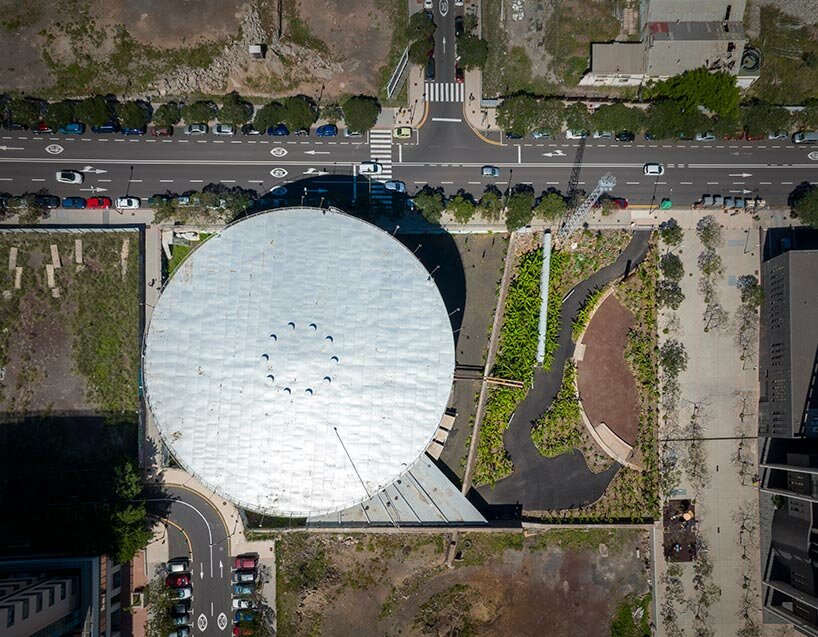 new banana garden by menis arquitectos takes over former oil tank in the canary islands
