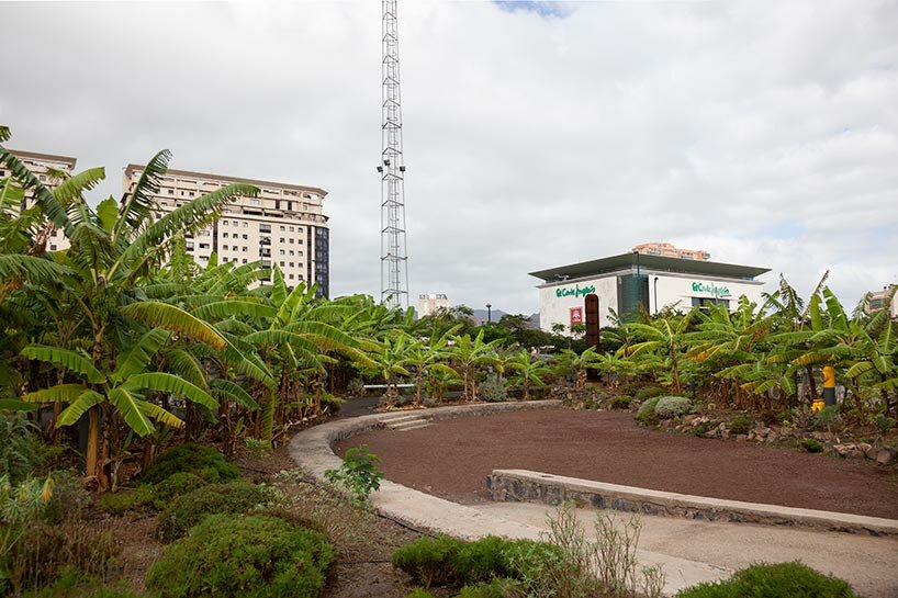 new banana garden by menis arquitectos takes over former oil tank in the canary islands
