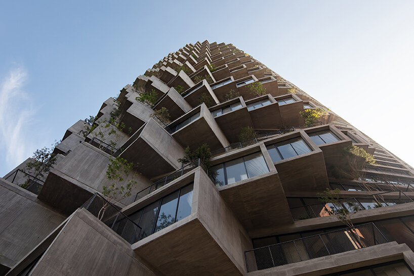 bjarke ingels’ IQON tower rises over quito with a pixelated facade of ...