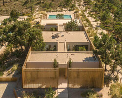 'casa em tróia' by BICA arquitectos seamlessly mirrors its coastal surroundings in portugal