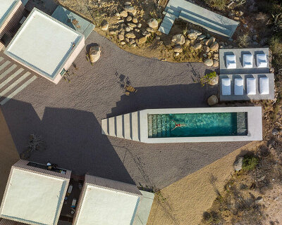 héctor coss arquitectos conceals ribbed concrete villa cubes among mexican desert creektop