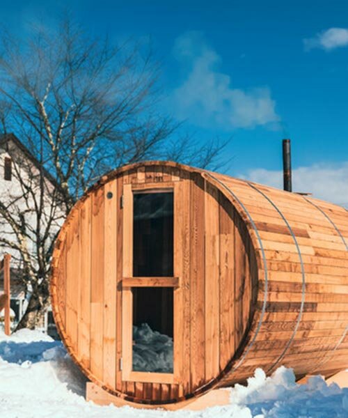 enjoy the hot steam in a 100-year-old soy sauce barrel sauna in japanese glamping resort