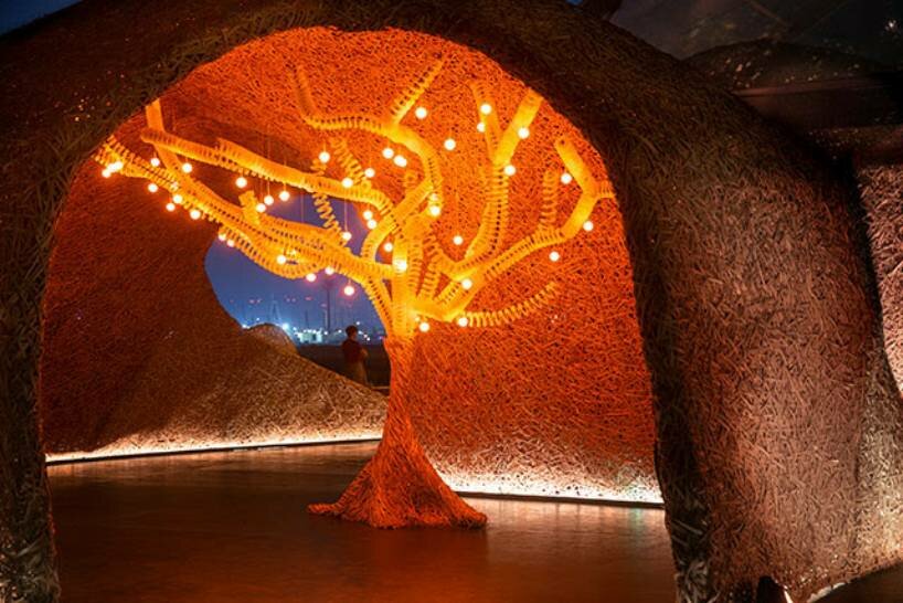 Hermès weaves a garden of life-size bamboo caves from recycled brushes in qatar
