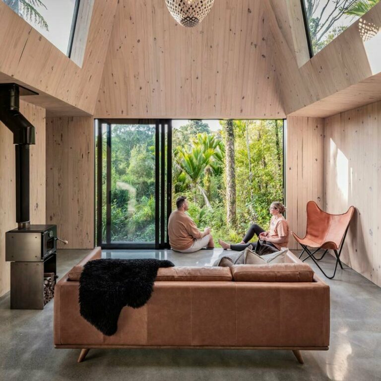 cut out skylights bring nature within biv cabin in new zealand