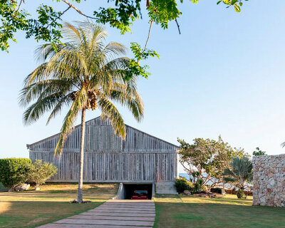 This Curved House By Infraestudio Opens Up To The Beach In West Havana