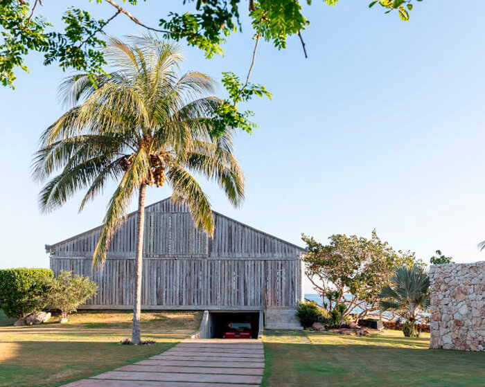 folding palm wood skin shields beachfront residence by infraestudio in havana