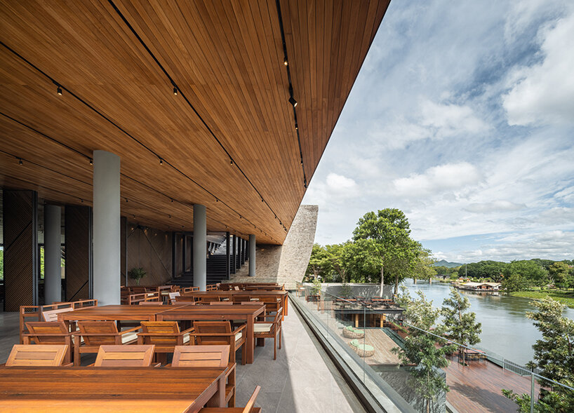 roof ridges dramatically collide atop the new keeree tara riverside in thailand
