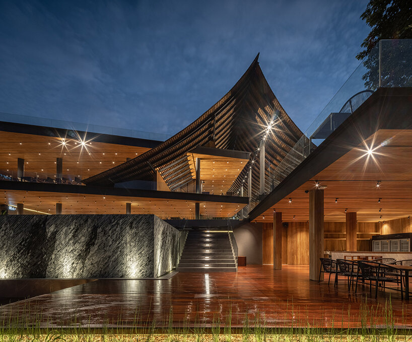 roof ridges dramatically collide atop the new keeree tara riverside in thailand
