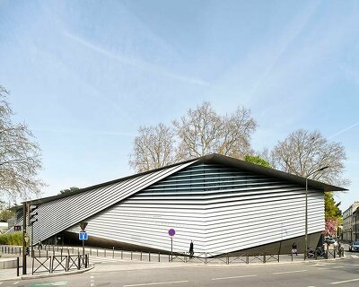 kengo kuma's irregular aluminum-clad facade invites visitors to albert kahn museum in france