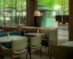 feathered light installation infuses restaurant in china with warm glow