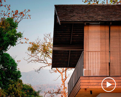 bamboo louvers and gable roof shield nong ho 17 house in thailand from tropical climate