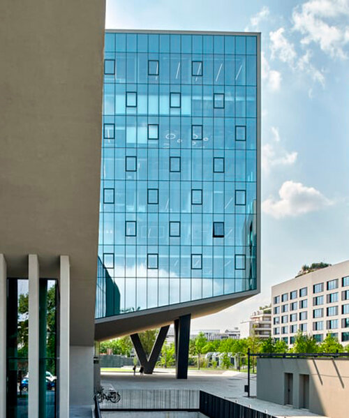 glass office building by ACPV towers over symbiosis business district in milan