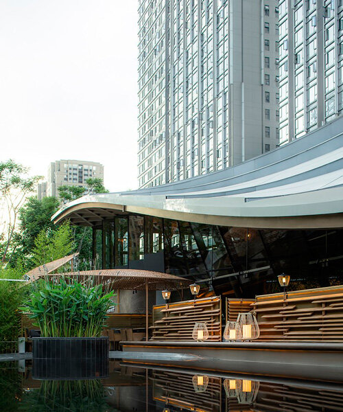 curvy ridged organic skin roofs a restaurant by BEHIVE architects in china