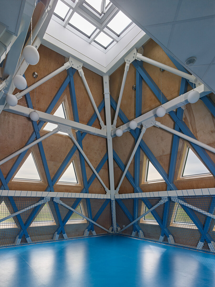 protruding, colored 'sheds' envelop architektura's kindergarten design in czechia