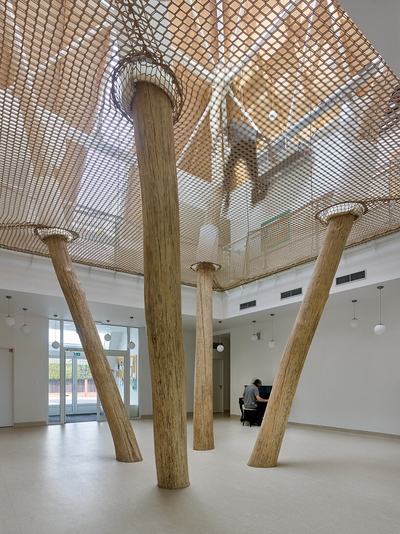 protruding, colored 'sheds' envelop architektura's kindergarten design in czechia