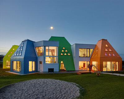 protruding, colored 'sheds' envelop architektura's kindergarten design in czechia