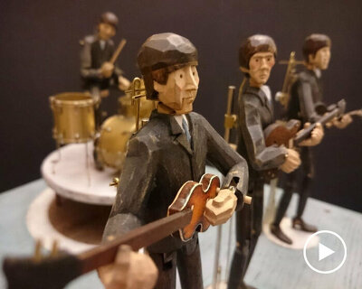 daniel bennan's hand-carved automated figurines of the beatles strum & drum in harmony