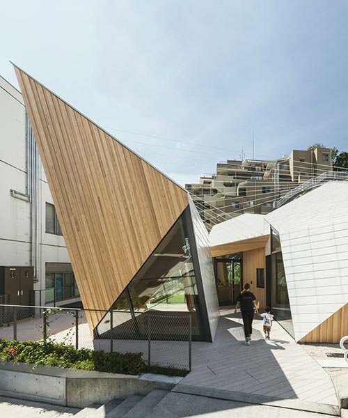 uneven geometry rises dramatically for kengo kuma's daycare center in japan