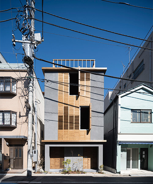 reversible shutter façade clads narrow house by motoki ishikawa architect in tokyo
