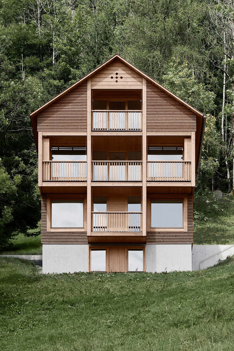 innauer matt perches secluded timber house along mountainous landscape in austria