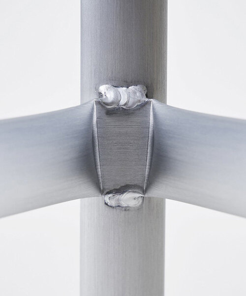 ximi li intricately folds slender aluminum tubes for MONOCHROME basic furniture series