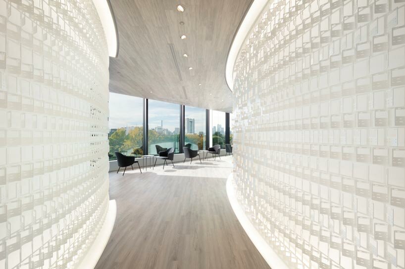 nendo engraves intricate patterns of pokémon cards into new office's organic arrangement