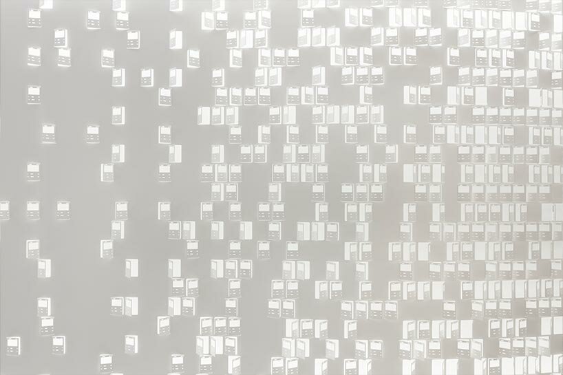 nendo engraves intricate patterns of pokémon cards into new office's organic arrangement