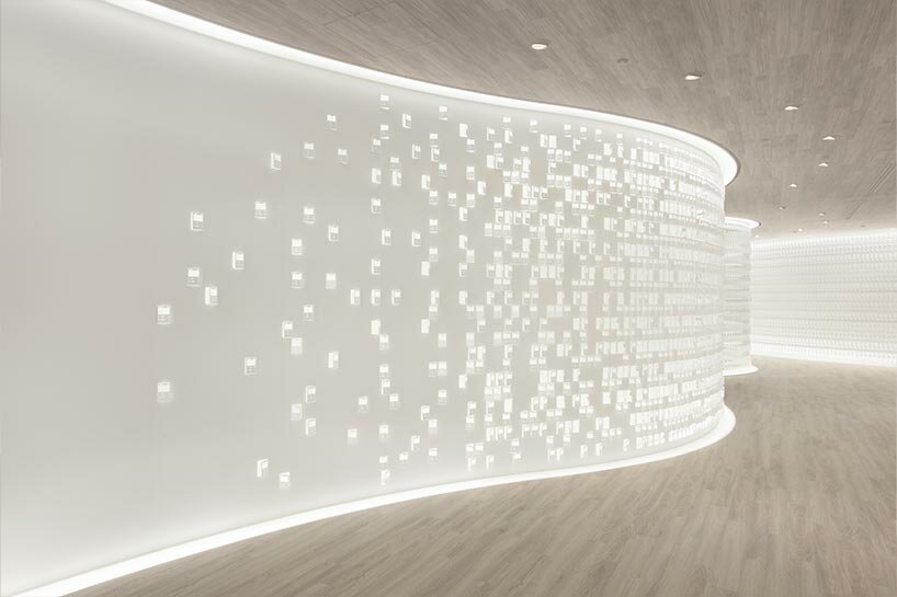 nendo engraves intricate patterns of pokémon cards into new office's organic arrangement