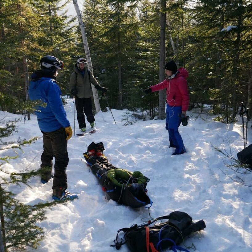 portable and durable 'nanoTRAINO' evacuation sled unfolds in seconds