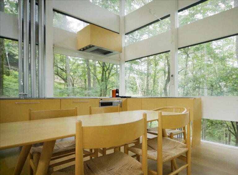hiding glass house in japanese forest sees 360 degrees through all