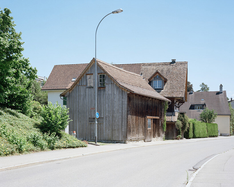 lukas lenherr transforms 1850s barn in switzerland into residence with all-wood interior
