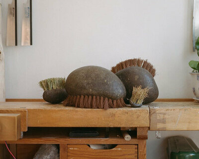 thomas yang & makiah roberts' organic stone brush creates a spiritual sweeping experience