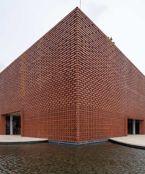 using bare bricks, MIA design studio shapes meditative club house along vietnamese coast