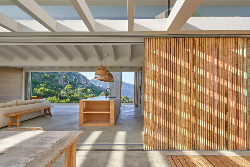 05 AM arquitectura crafts a bamboo facade for its house in aiguablava, spain