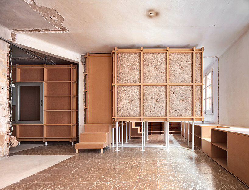 TAKK exposes old partitions + electrical installations in energy-conscious barcelona revamp