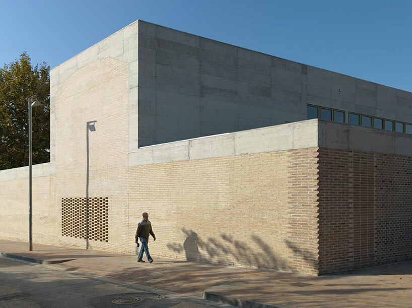 chapel-like brick structure encloses BAAS arquitectura's health center in barcelona