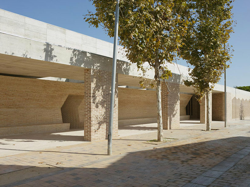 chapel-like brick structure encloses BAAS arquitectura's health center in barcelona