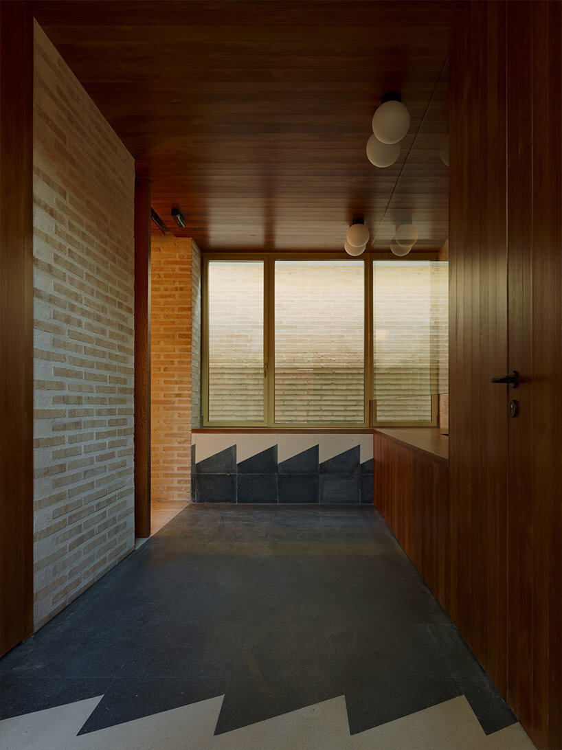 chapel-like brick structure encloses BAAS arquitectura's health center in barcelona