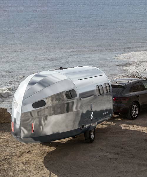bowlus clads bullet-shaped travel trailer in silver armor