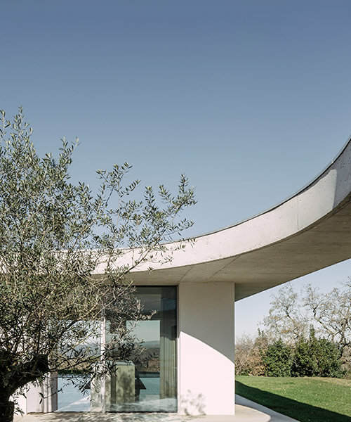bold concrete geometries embrace bruno dias' casa chouso in a portuguese village