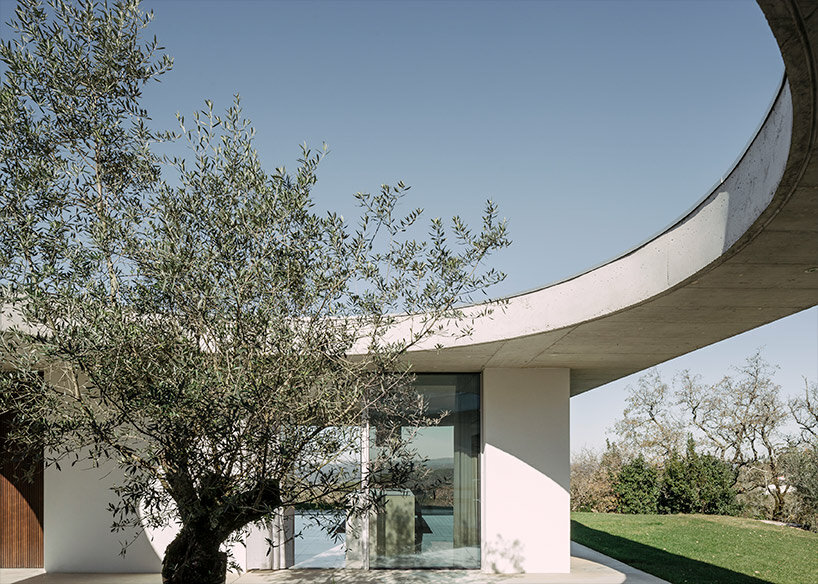 concrete geometries embrace bruno dias' casa chouso in portugal
