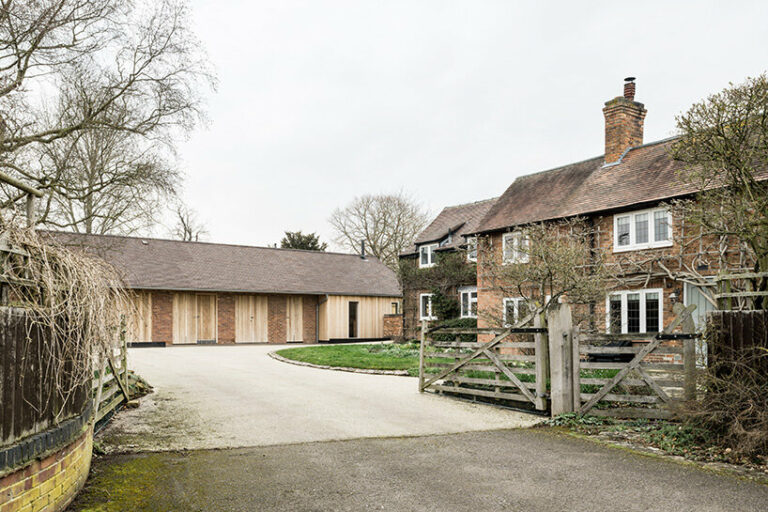 english barn transformed into picturesque garden home by manea kella