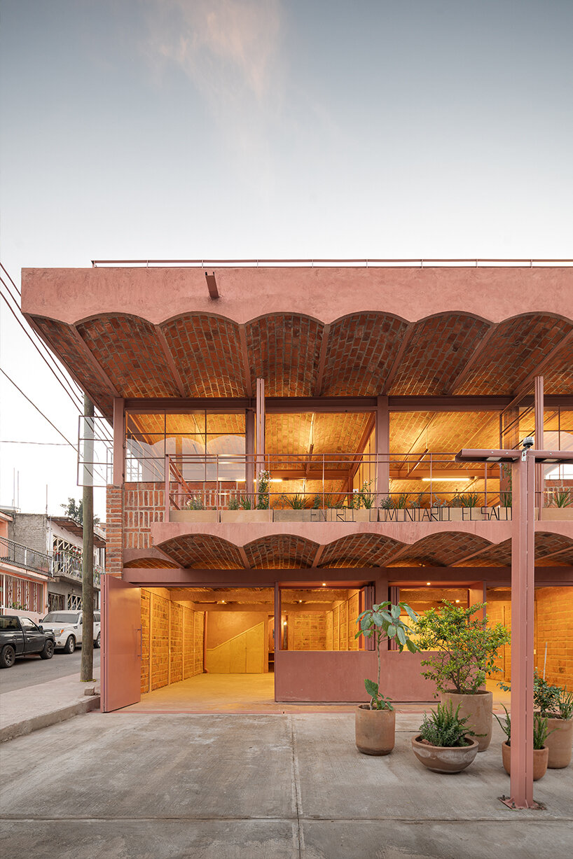 A domed brick community center built by citizens adorns rural Mexico
