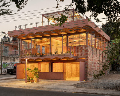 vaulted brickwork community center built by citizens adorns rural mexico